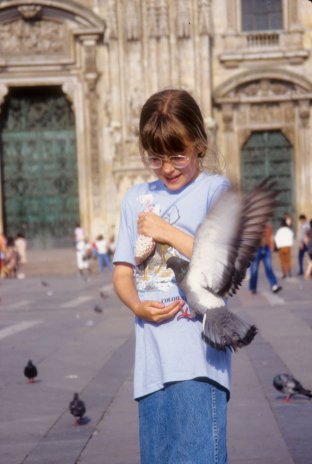 Sally feeding pigeons