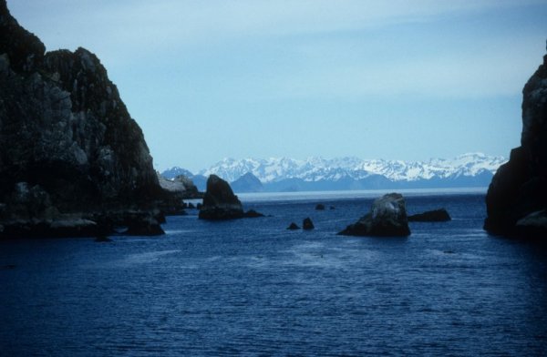 rocks, sea, and mountains