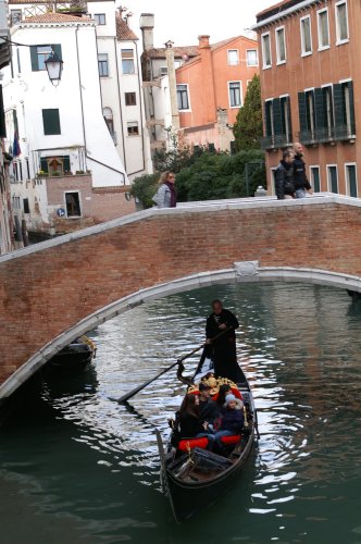 gondola under a bridge