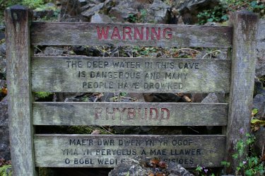 warning sign at Porth yr Ogof