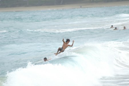 Surfer falling