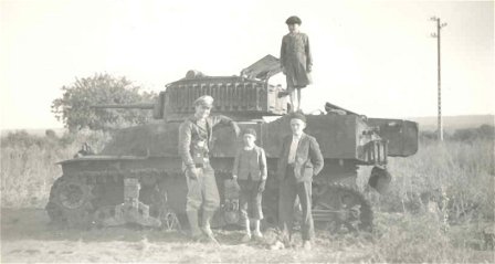 Billy with tank and French children