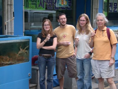 family outside a restaurant