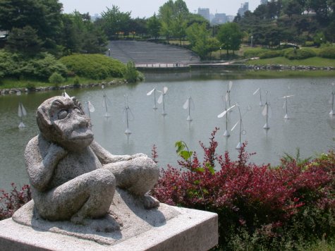 lake and sculpture